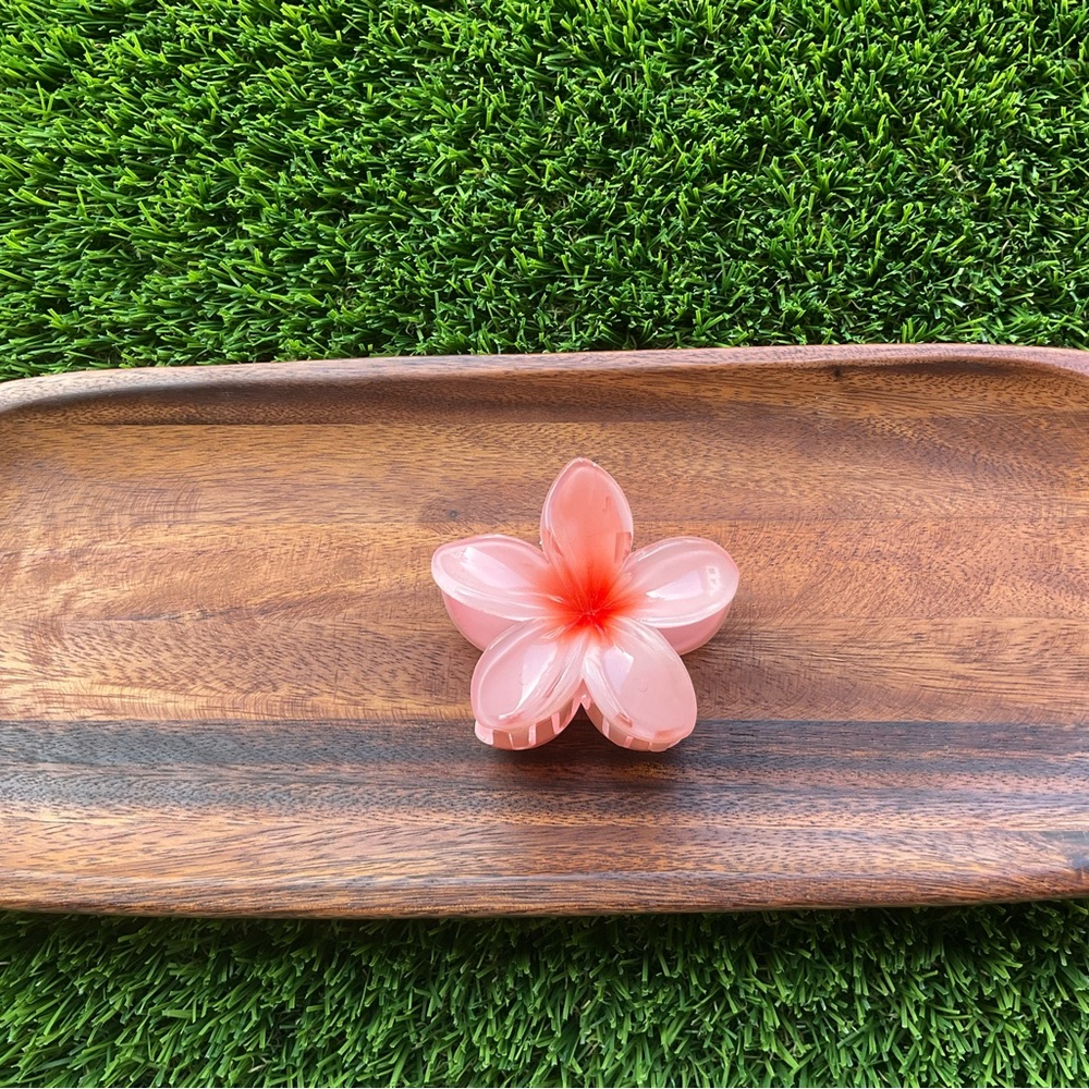 Pink/orange coral colored flower hair clip